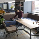 Professionals working in furnished corporate apartments in New York